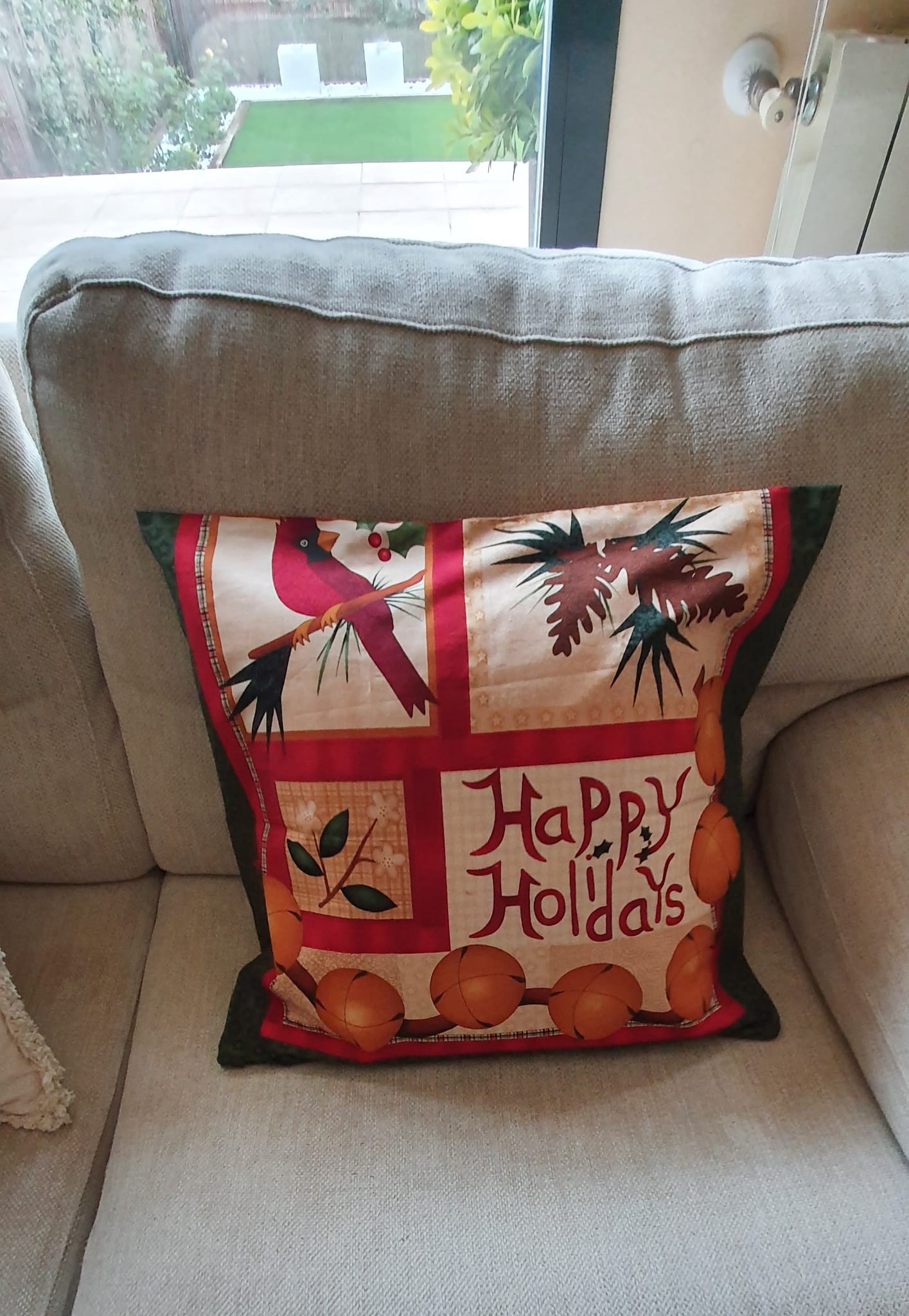 Cojín de patchwork hecho a mano por una alumna